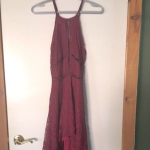 Deep burgundy dress with eyelet line cutouts
